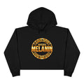 Made with Melanin crop hoodie with a vintage-inspired circular logo.
