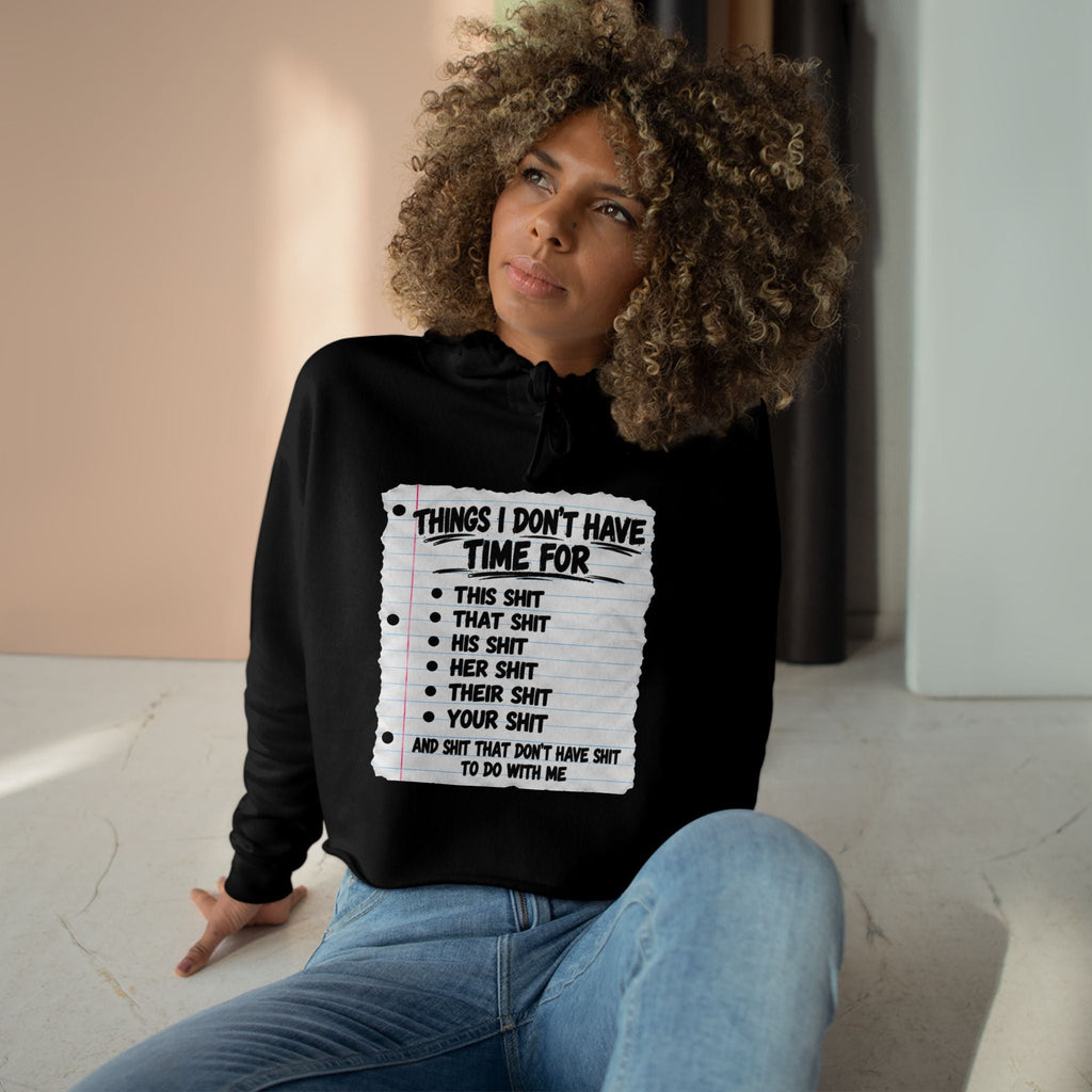 Women's statement crop hoodie with a playful printed list graphic.