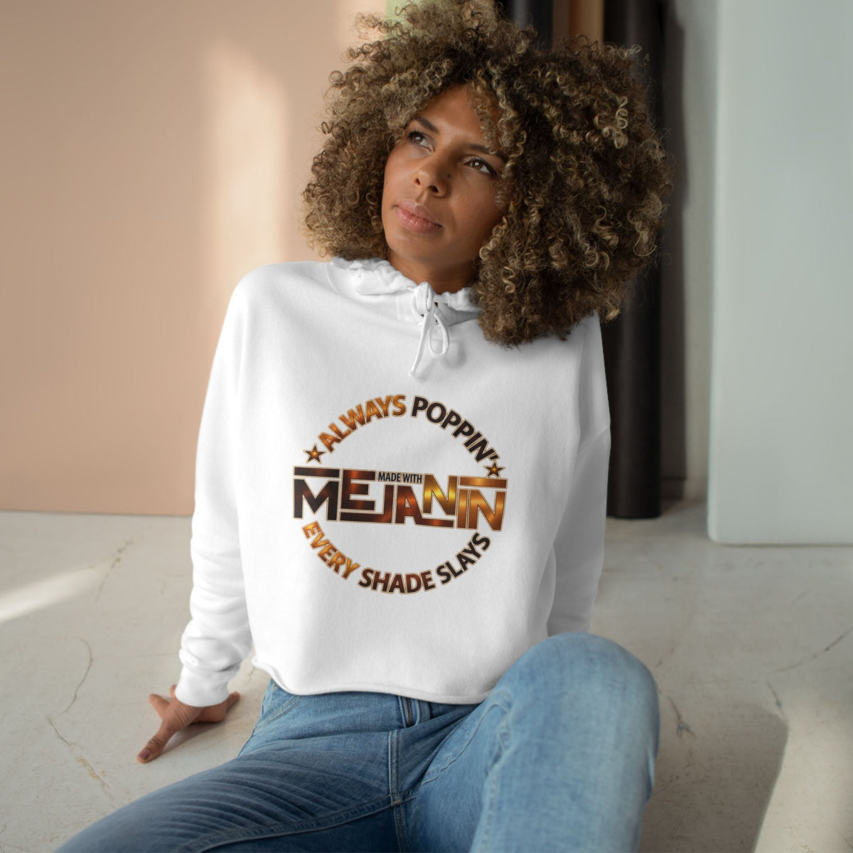 Statement crop hoodie with 'Always Poppin' Melanin' print.
