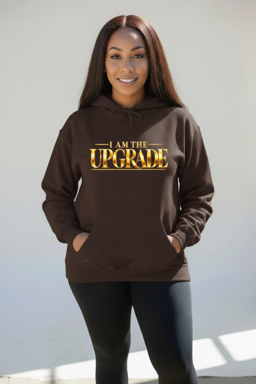 I Am The Upgrade fleece graphic hoodie featuring an empowering gold typography design.