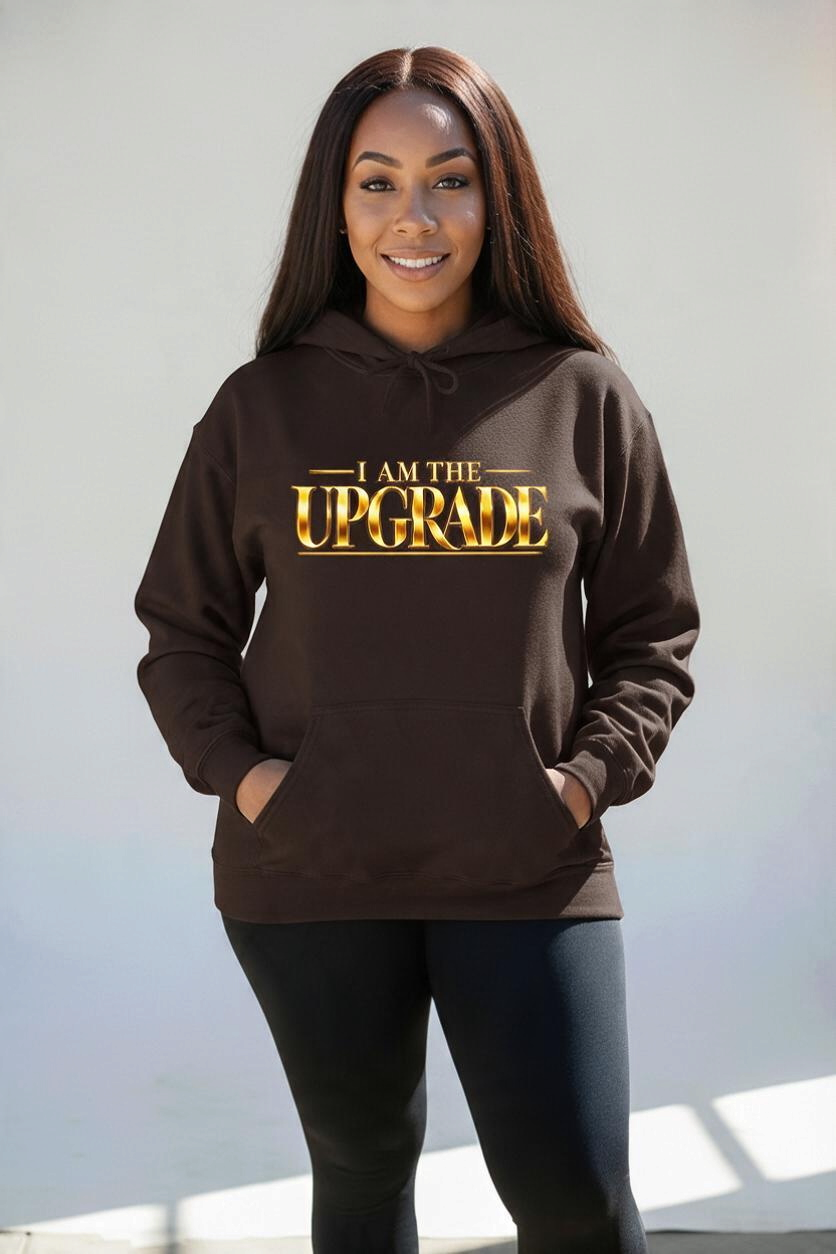 I Am The Upgrade pullover hoodie with bold metallic gold statement lettering.