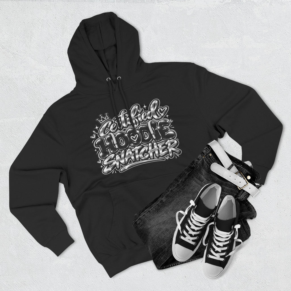 Throw it in the Bag black fleece hoodie with Certified Hoodie Snatcher graphic, styled with jeans and sneakers.