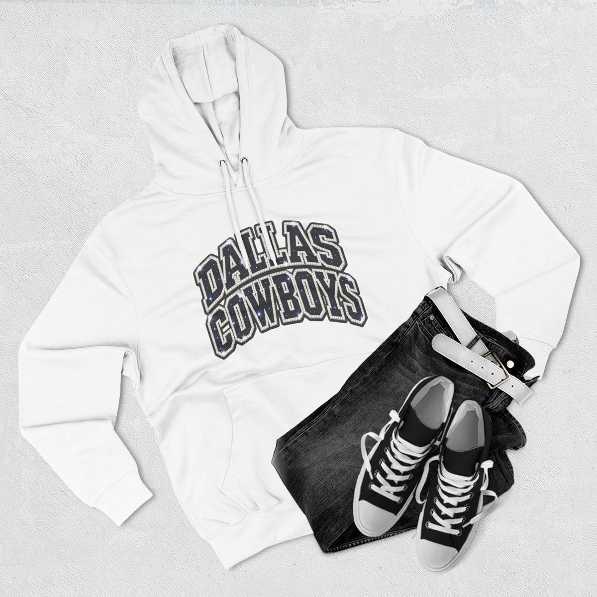 Throw it in the Bag Dallas Cowboys white fleece hoodie with script logo, styled with black jeans and sneakers.