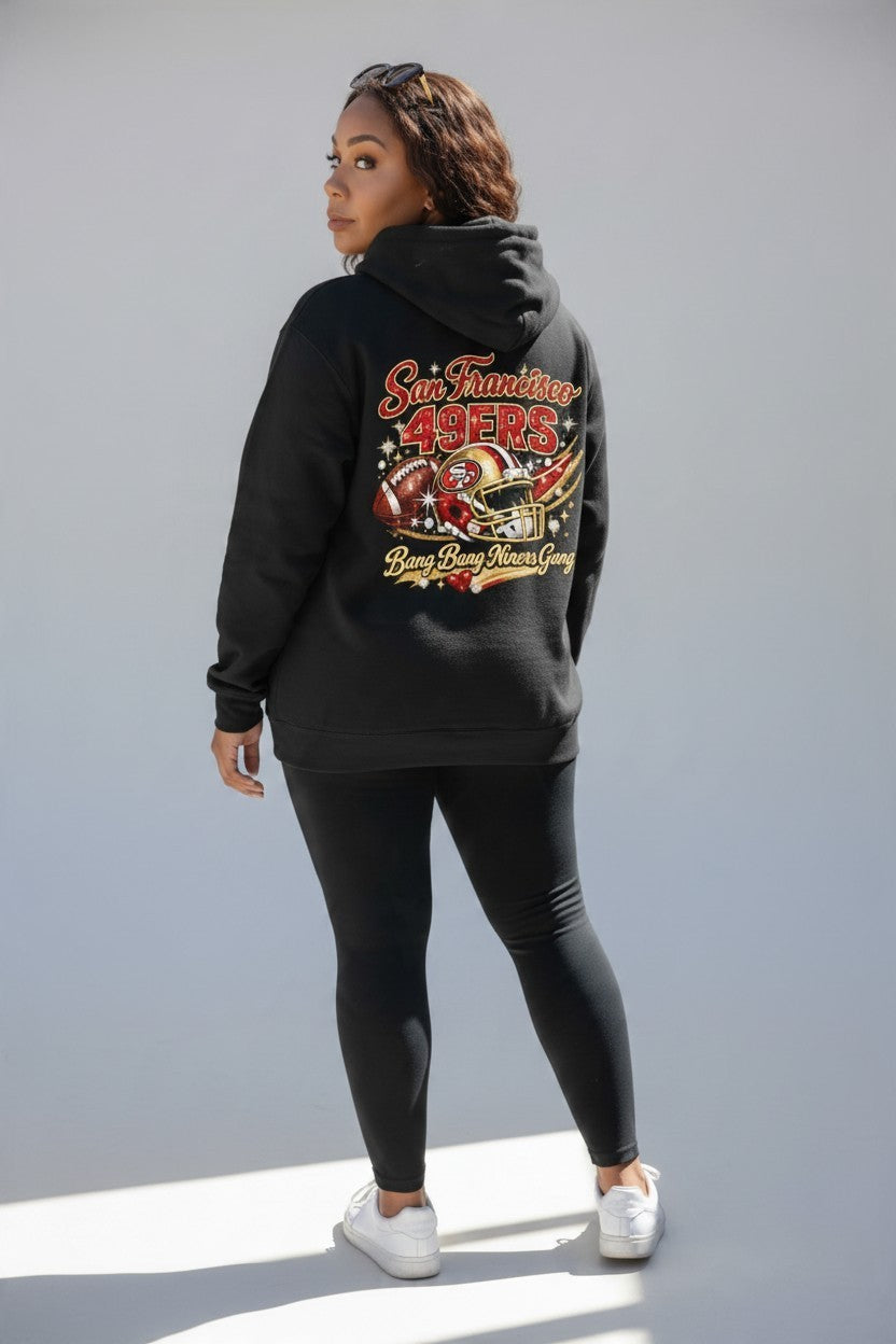 Throw it in the Bag black fleece hoodie with San Francisco 49ers football graphic on back worn by a woman